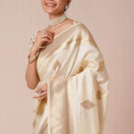 Cream & Gold Toned Woven Design Banarasi Silk Saree